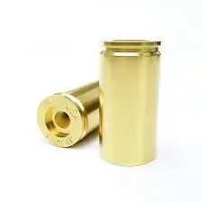 A photo showing a close-up of high-quality brass casings being inspected for quality